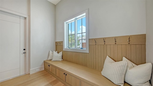 15315 Anchorage Pl, Lakewood Ranch, FL 34202 - mudroom with light wood-style floors and wainscoting