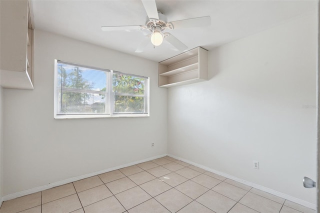 1404 Dartmouth Dr, Bradenton, FL 34207 - empty room with ceiling fan and light tile patterned flooring