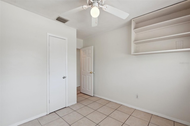 1404 Dartmouth Dr, Bradenton, FL 34207 - empty room featuring ceiling fan and light tile patterned floors