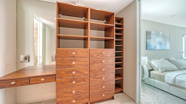 350 Golden Gate Pt Unit 61, Sarasota, FL 34236 - spacious closet featuring light carpet