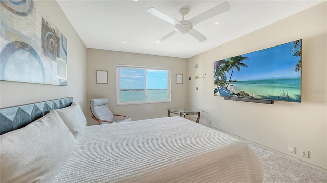 350 Golden Gate Pt Unit 61, Sarasota, FL 34236 - carpeted bedroom with a ceiling fan and baseboards