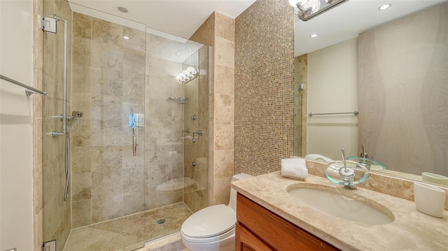 350 Golden Gate Pt Unit 61, Sarasota, FL 34236 - full bathroom with vanity, a tile shower, and recessed lighting