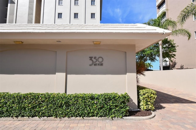 350 Golden Gate Pt Unit 61, Sarasota, FL 34236 - community sign with an attached garage