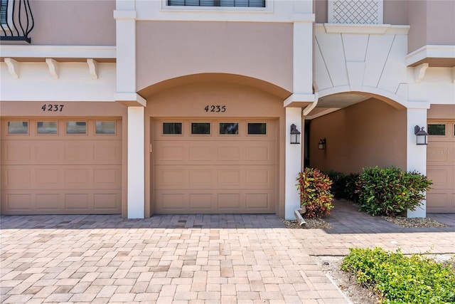 4235 Overture Cir Unit 4235, Bradenton, FL 34209 - garage featuring decorative driveway