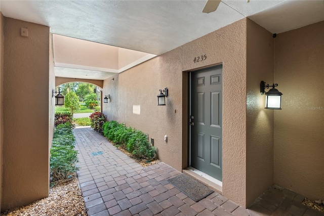 4235 Overture Cir Unit 4235, Bradenton, FL 34209 - doorway to property with stucco siding