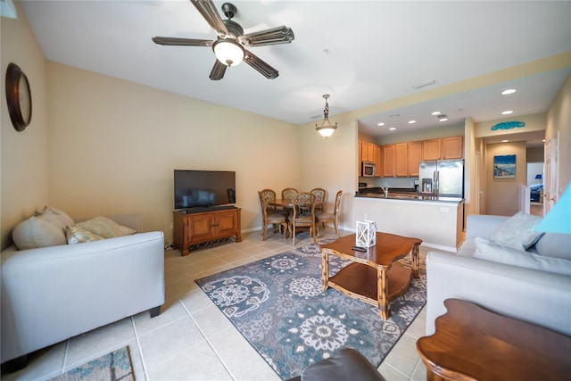 4235 Overture Cir Unit 4235, Bradenton, FL 34209 - living room with light tile patterned floors, a ceiling fan, and recessed lighting