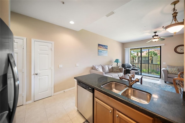 4235 Overture Cir Unit 4235, Bradenton, FL 34209 - kitchen featuring stainless steel dishwasher, open floor plan, refrigerator, a ceiling fan, and recessed lighting