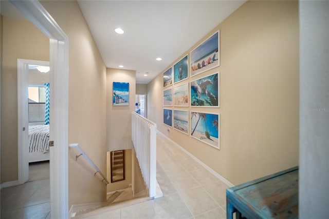 4235 Overture Cir Unit 4235, Bradenton, FL 34209 - hallway featuring an upstairs landing, tile patterned floors, and recessed lighting