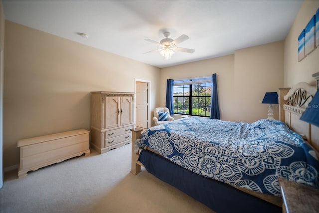 4235 Overture Cir Unit 4235, Bradenton, FL 34209 - bedroom with light colored carpet and a ceiling fan