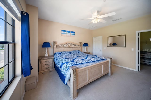 4235 Overture Cir Unit 4235, Bradenton, FL 34209 - bedroom with carpet floors and a ceiling fan