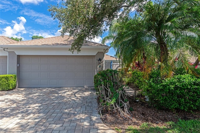 5417 Champagne Unit 63, Sarasota, FL 34235 - garage with decorative driveway
