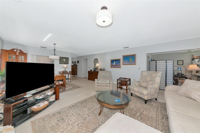 5417 Champagne Unit 63, Sarasota, FL 34235 - living area featuring carpet floors