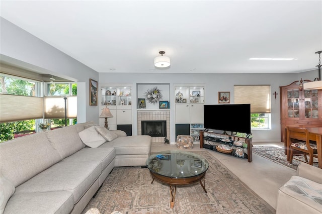 5417 Champagne Unit 63, Sarasota, FL 34235 - living area featuring a fireplace