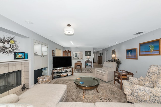 5417 Champagne Unit 63, Sarasota, FL 34235 - living area featuring a fireplace