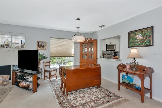 5417 Champagne Unit 63, Sarasota, FL 34235 - home office with light carpet and baseboards