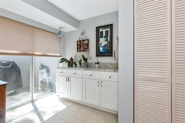 5417 Champagne Unit 63, Sarasota, FL 34235 - bar with light tile patterned flooring