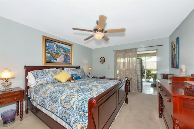 5417 Champagne Unit 63, Sarasota, FL 34235 - bedroom with light carpet and a ceiling fan
