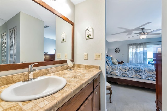 5417 Champagne Unit 63, Sarasota, FL 34235 - bathroom with ensuite bathroom, vanity, and ceiling fan
