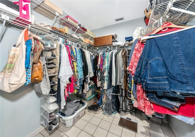 5417 Champagne Unit 63, Sarasota, FL 34235 - walk in closet with tile patterned floors