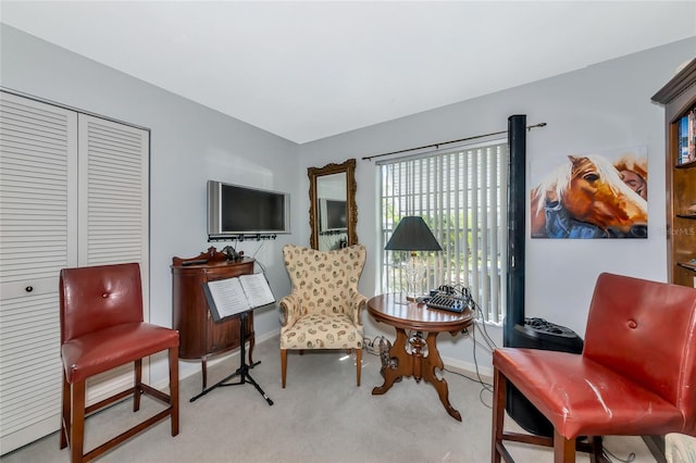 5417 Champagne Unit 63, Sarasota, FL 34235 - living area featuring carpet floors and baseboards