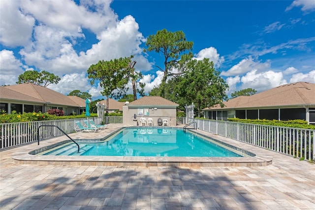 5417 Champagne Unit 63, Sarasota, FL 34235 - community pool featuring a patio