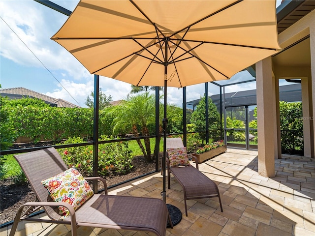 5364 Salcano St, Sarasota, FL 34238 - view of patio / terrace featuring glass enclosure