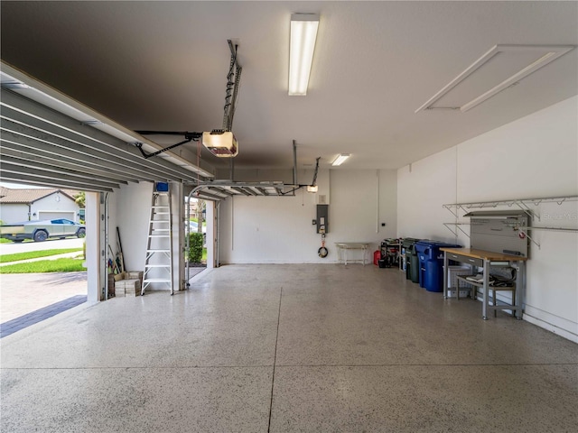 5364 Salcano St, Sarasota, FL 34238 - garage featuring a garage door opener