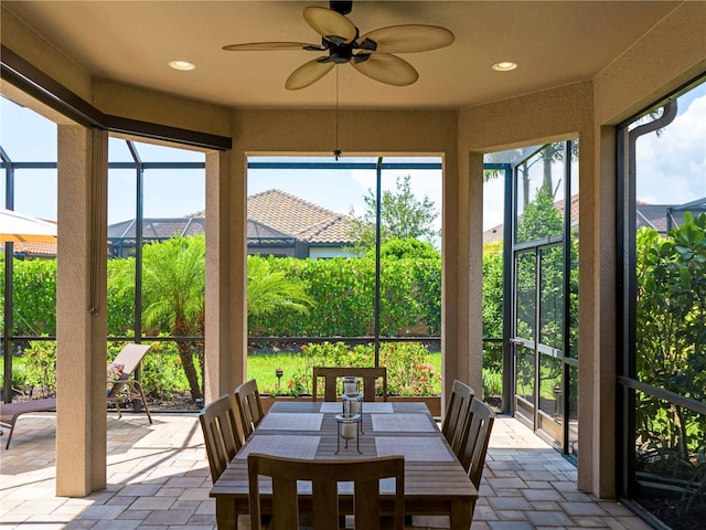 5364 Salcano St, Sarasota, FL 34238 - sunroom featuring recessed lighting, plenty of natural light, and stone tile flooring