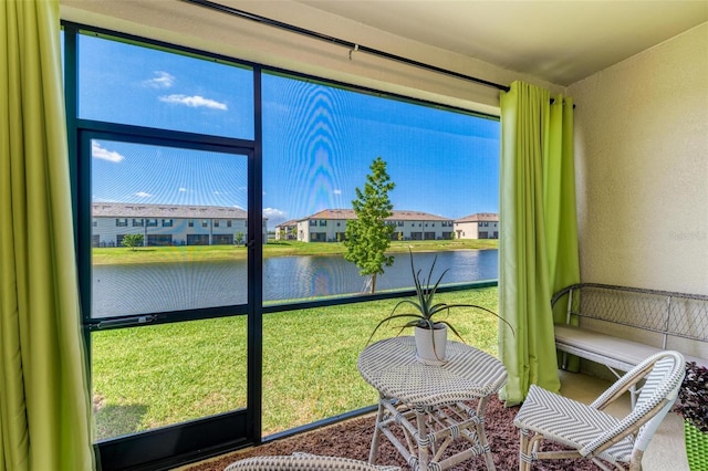 15164 Sunny Day Dr, Bradenton, FL 34211 - sunroom featuring a water view and a residential view