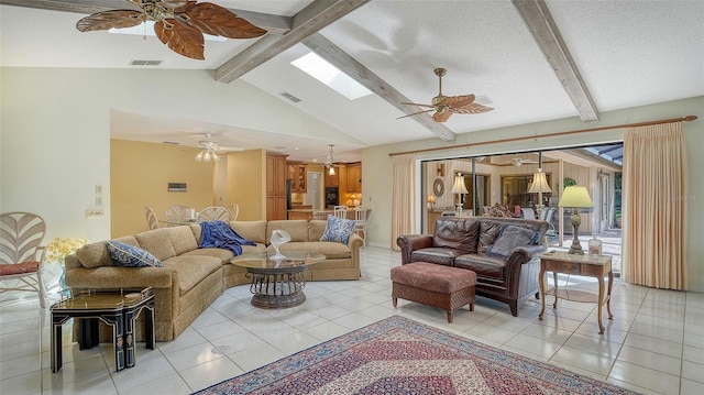 7426 Weeping Willow Blvd, Sarasota, FL 34241 - living area featuring ceiling fan, light tile patterned floors, and a skylight
