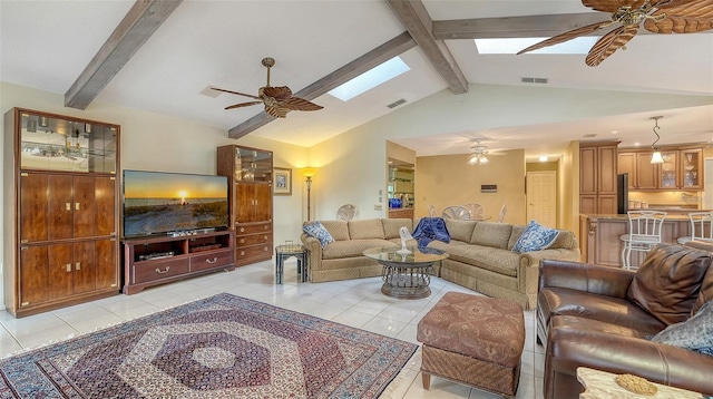 7426 Weeping Willow Blvd, Sarasota, FL 34241 - living area featuring a ceiling fan, light tile patterned floors, and a skylight