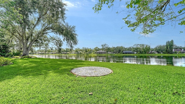 7426 Weeping Willow Blvd, Sarasota, FL 34241 - view of grassy yard with a water view