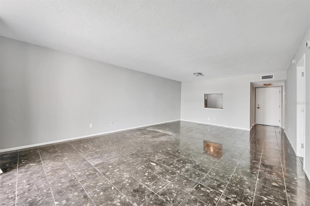 101 S Gulfstream Ave Unit 15C, Sarasota, FL 34236 - unfurnished living room with baseboards