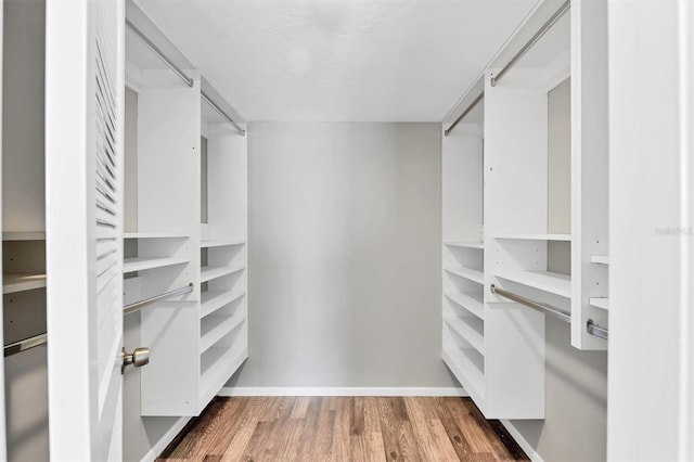 101 S Gulfstream Ave Unit 15C, Sarasota, FL 34236 - spacious closet with wood finished floors