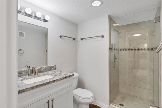 101 S Gulfstream Ave Unit 15C, Sarasota, FL 34236 - full bath with a stall shower, vanity, and a textured ceiling