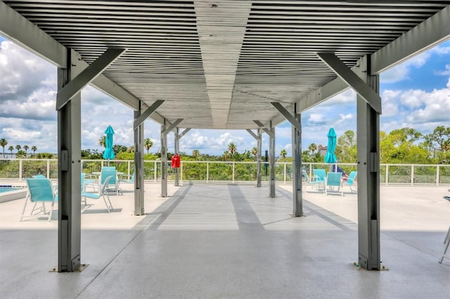 101 S Gulfstream Ave Unit 15C, Sarasota, FL 34236 - view of home's community featuring a pergola, a swimming pool, and a patio area