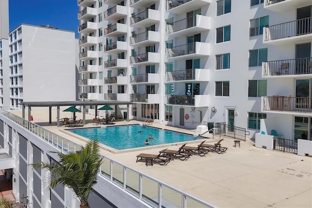 101 S Gulfstream Ave Unit 15C, Sarasota, FL 34236 - community pool featuring a patio