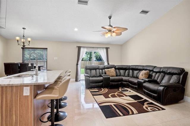 2761 Feiffer Cir, Sarasota, FL 34235 - living area featuring ceiling fan and a chandelier