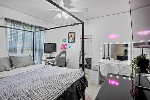 2761 Feiffer Cir, Sarasota, FL 34235 - bedroom with light wood-type flooring and ceiling fan
