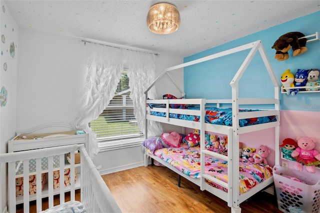 2761 Feiffer Cir, Sarasota, FL 34235 - bedroom with wood finished floors
