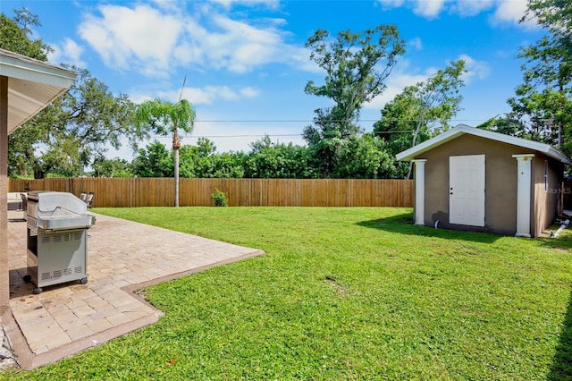 2761 Feiffer Cir, Sarasota, FL 34235 - fenced backyard with a patio and a storage shed