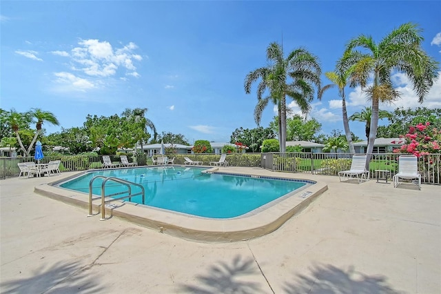 3641 Somerville Dr Unit 1506, Sarasota, FL 34232 - community pool featuring a patio