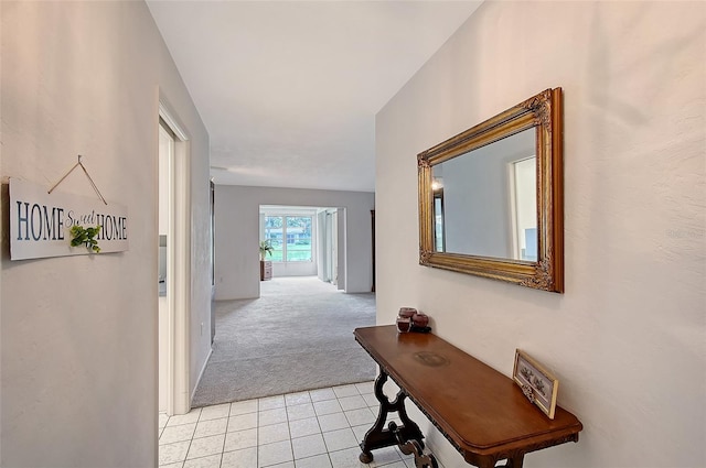 3641 Somerville Dr Unit 1506, Sarasota, FL 34232 - hall featuring light carpet and light tile patterned floors