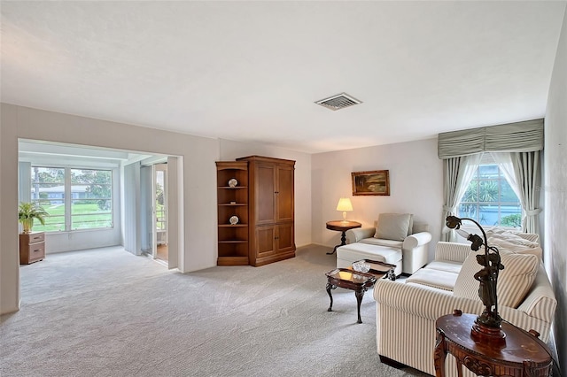 3641 Somerville Dr Unit 1506, Sarasota, FL 34232 - living room featuring light colored carpet