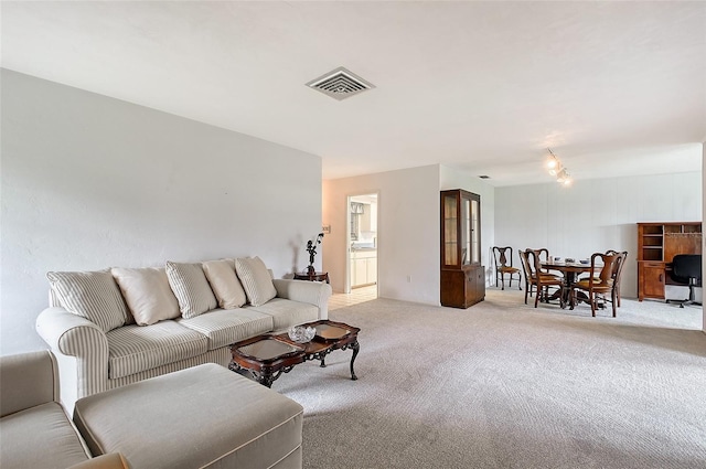 3641 Somerville Dr Unit 1506, Sarasota, FL 34232 - living room featuring light carpet