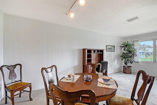 3641 Somerville Dr Unit 1506, Sarasota, FL 34232 - dining room with light carpet