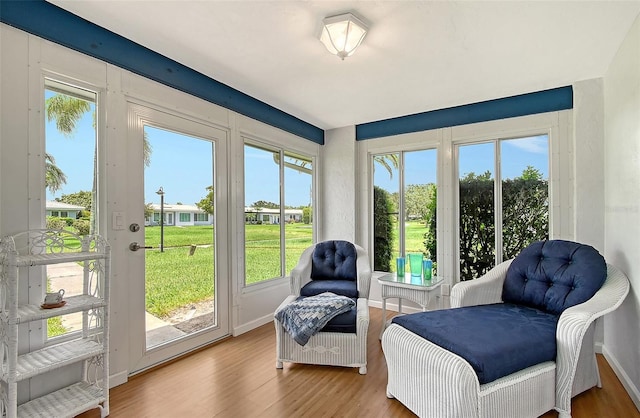 3641 Somerville Dr Unit 1506, Sarasota, FL 34232 - living area featuring wood finished floors and baseboards