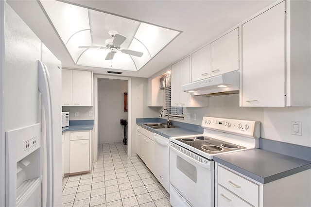 3641 Somerville Dr Unit 1506, Sarasota, FL 34232 - kitchen featuring white appliances, under cabinet range hood, white cabinets, a ceiling fan, and light tile patterned floors