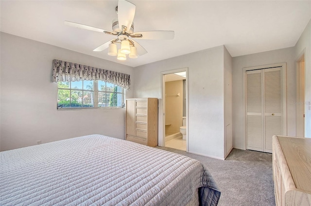 3641 Somerville Dr Unit 1506, Sarasota, FL 34232 - carpeted bedroom featuring a closet, ensuite bathroom, and ceiling fan