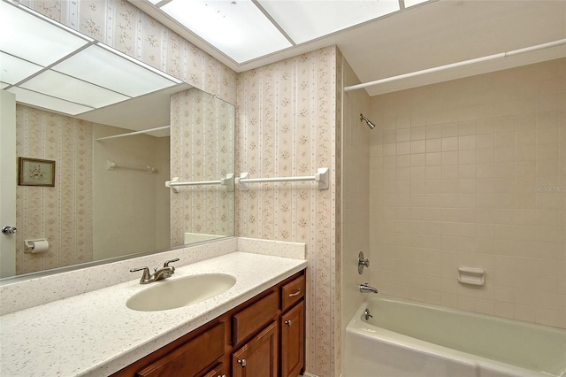 3641 Somerville Dr Unit 1506, Sarasota, FL 34232 - full bathroom with wallpapered walls, bathtub / shower combination, and vanity